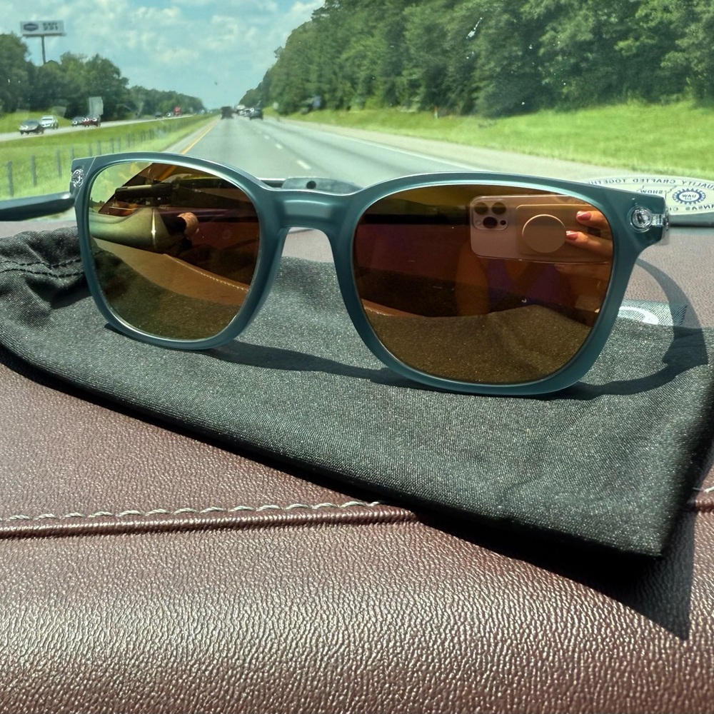 Oakley: Prizm Rose Gold Polarized Lenses, With Matte Crystal Blue Frame